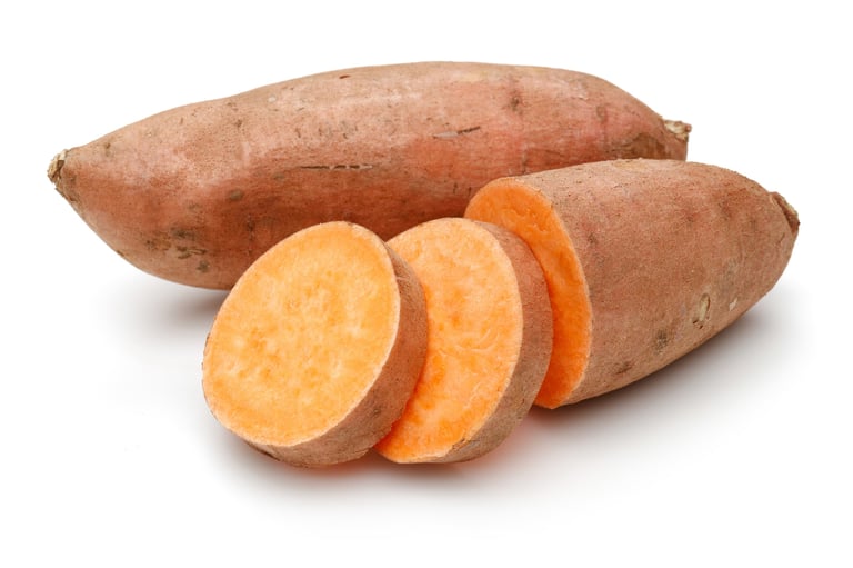 Sweet potato with slices isolated on white background
